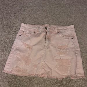 Distressed pink jean skirt